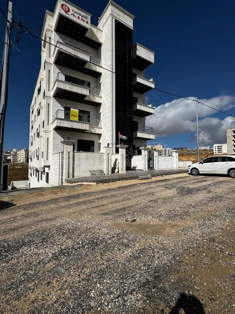 شقة في شقة أرضية استثمارية مقابل جامعة العلوم التطبيقية  - 73,000 دأ - صورة 1