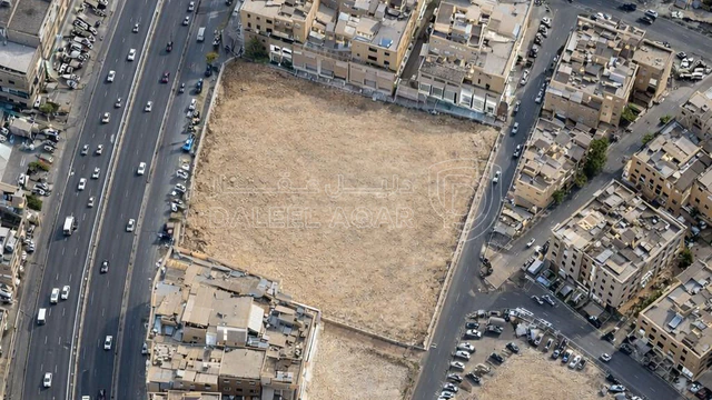أرض - أرض تجاري على شارع المدينة موقع مميز وحيوي - 18500000 دأ