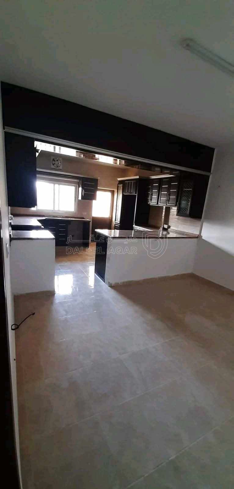 شقة في الطفيلة-العيص-خلف أسواق القيسي ومجمع عكاظ التجاري  - 32,000 دأ - صورة 1
