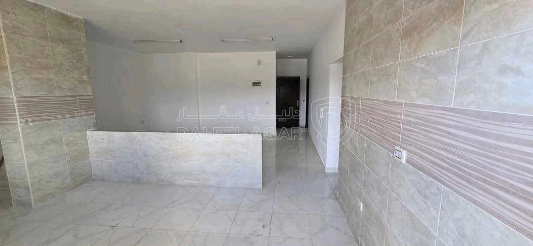 شقة في الطفيلة-العيص-خلف أسواق القيسي ومجمع عكاظ التجاري  - 32,000 دأ - صورة 1