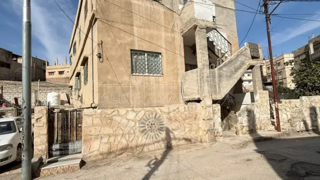 مبنى - الزرقاء-الزواهرة بالقرب من دوار الدلة - 45000 دأ