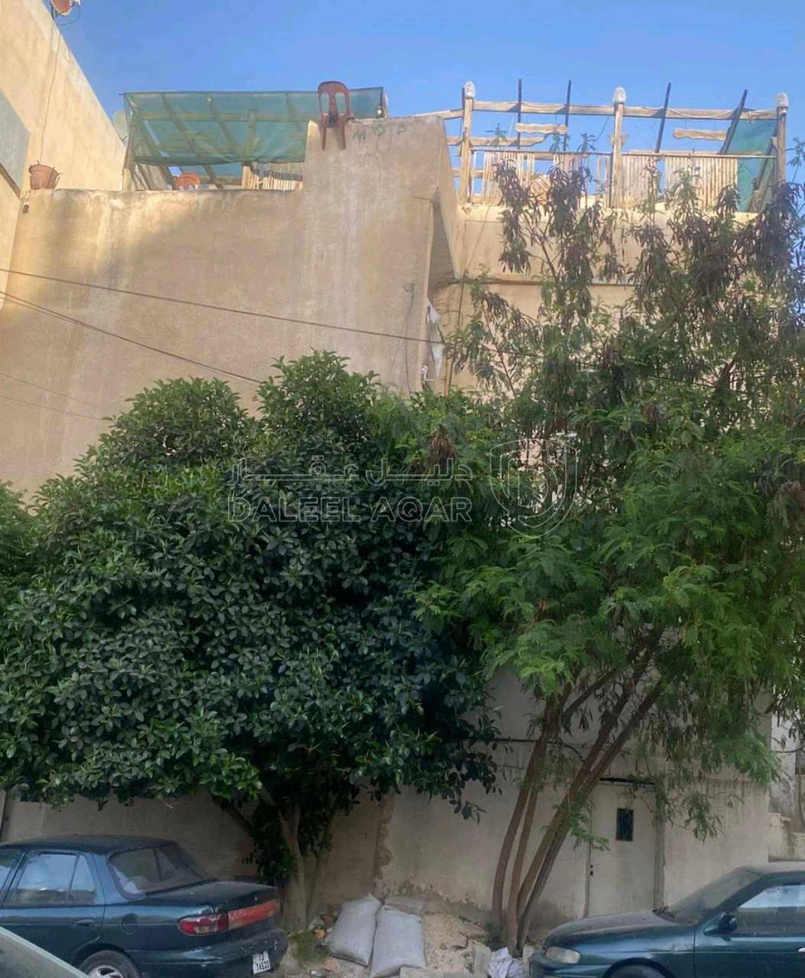 مبنى في الجبل الابيض حي الخلايلة بجانب مسجد المحتسبين - 27,000 دأ - صورة 1