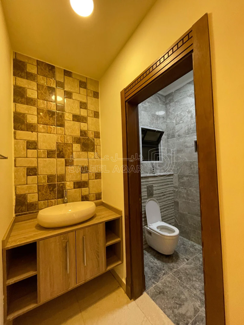 شقة في ضاحية الرشيد مقابل صيدلية كرز / قرب دوار المغناطيس - 155,000 دأ - صورة 1