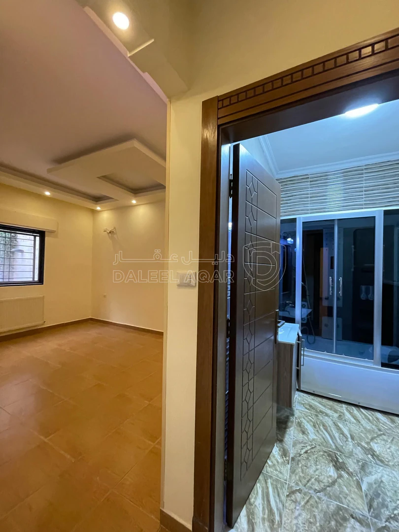 شقة في ضاحية الرشيد مقابل صيدلية كرز / قرب دوار المغناطيس - 155,000 دأ - صورة 1