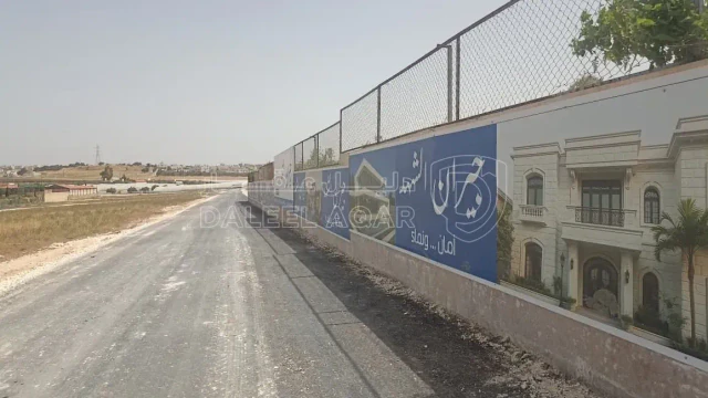 أرض في  مشروع أراضي جيران الشهد - 62,000 دأ - صورة 1
