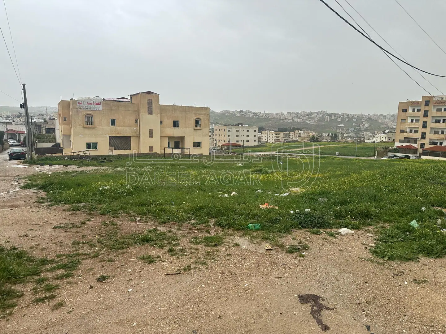 أرض في الثنيه بالقرب من الموسسه العسكريه - 50,000 دأ - صورة 1