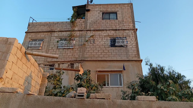 مبنى في دوقرة الحي العالي مقابل كازية جوبترول - 40,000 دأ - صورة NaN