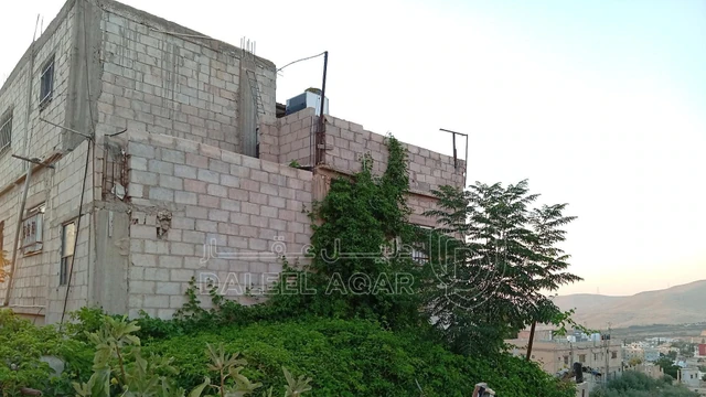 مبنى في دوقرة الحي العالي مقابل كازية جوبترول - 40,000 دأ - صورة NaN