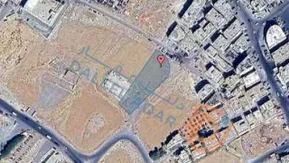 أرض - ارض صناعيه للبيع على شارعين بواجهه  100 متر  - 950000 دأ