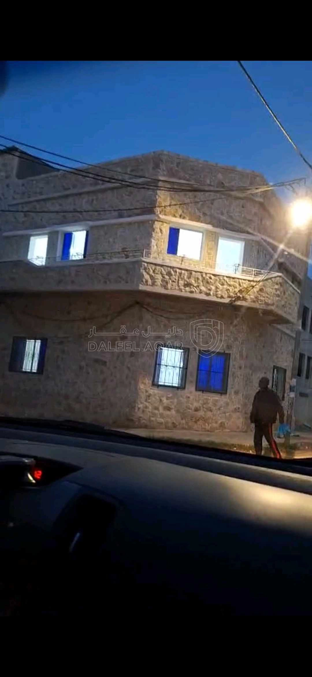 مبنى في الشونة الشمالية قريب موقف باصات اربد الشونة - 20,000 دأ - صورة 1