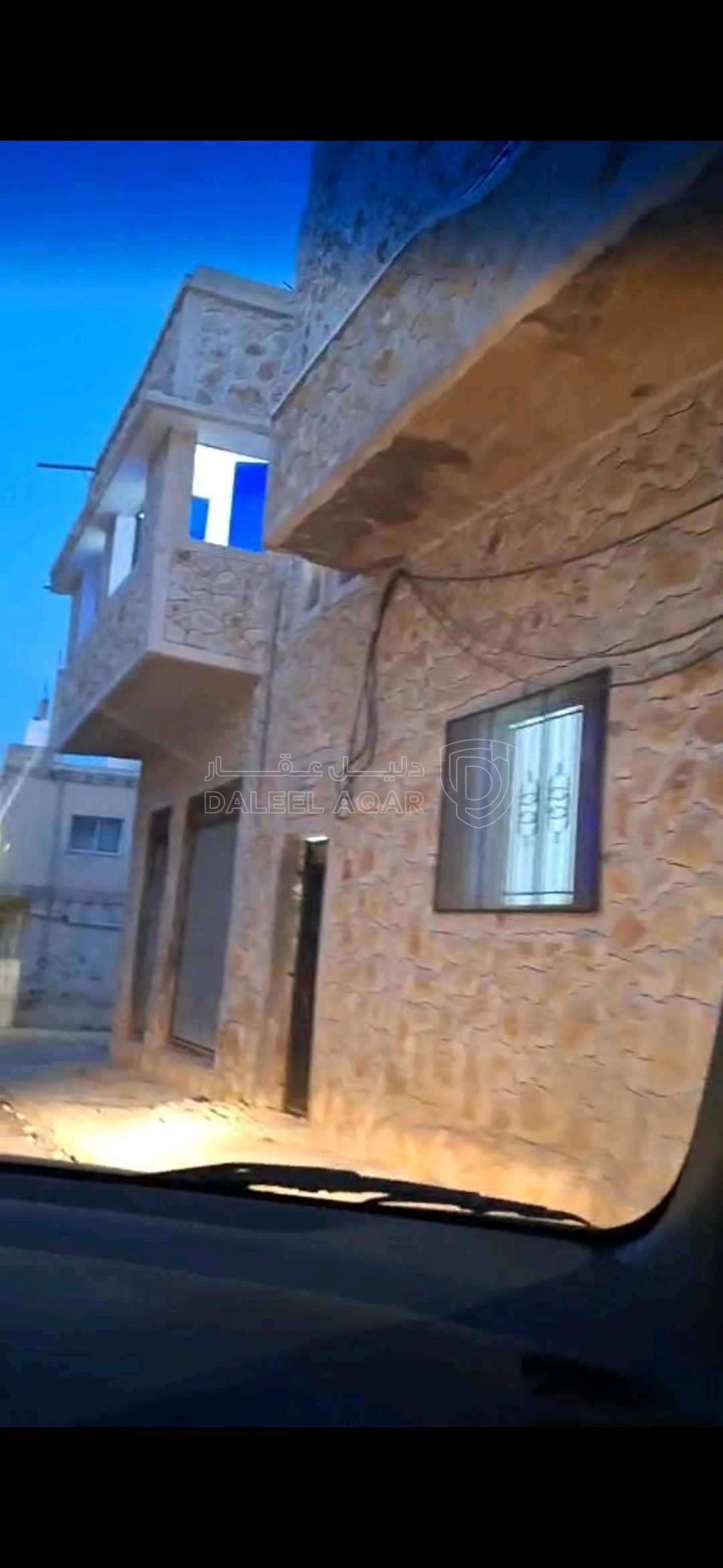 مبنى في الشونة الشمالية قريب موقف باصات اربد الشونة - 20,000 دأ - صورة 2