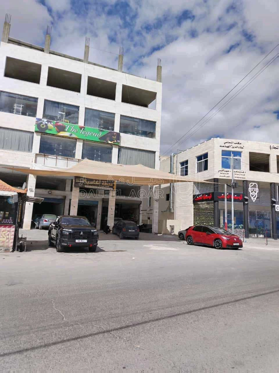 مبنى في الزرقاء شارع الكرامة  - 600,000 دأ - صورة 1
