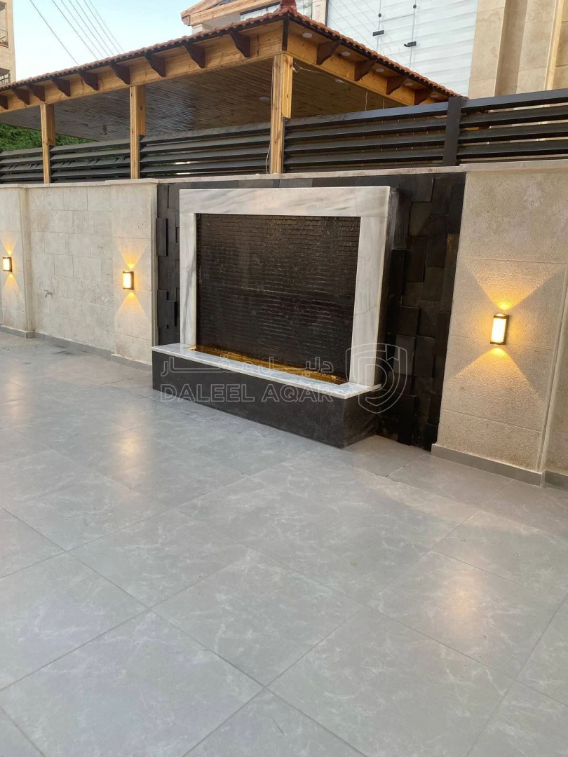 شقة في شقة ارضية مع ترس  للبيع في مرج الحمام اسكان عالية - 168,000 دأ - صورة 1