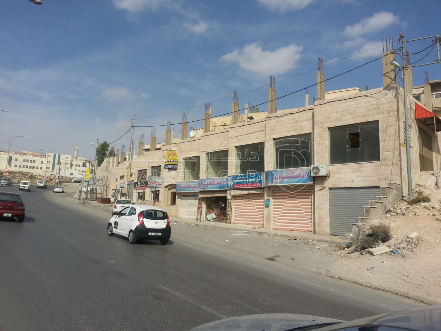 مبنى في الرصيفة حي الرشيد - 400,000 دأ - صورة 1