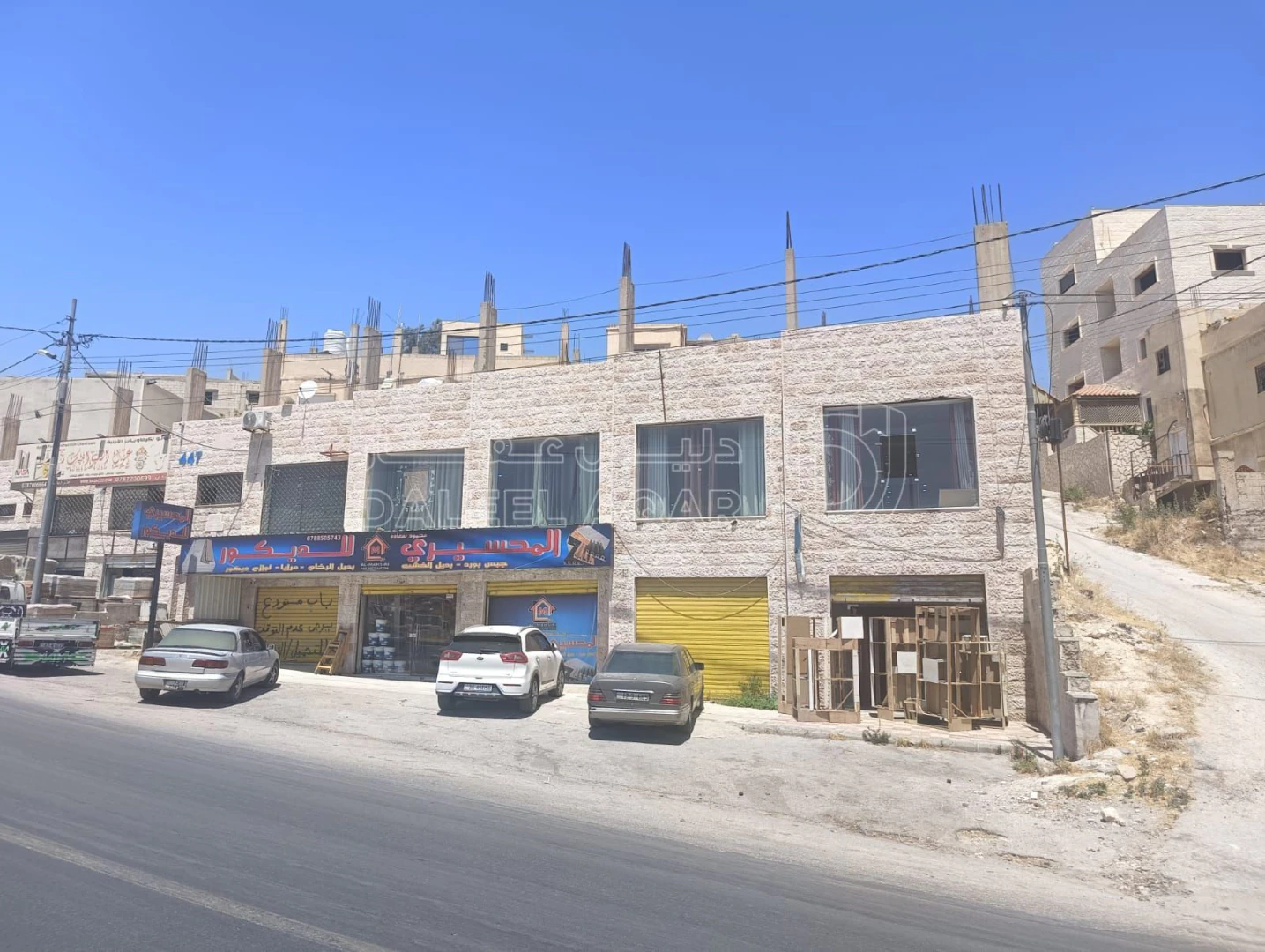 مبنى في الرصيفة حي الرشيد - 400,000 دأ - صورة 1