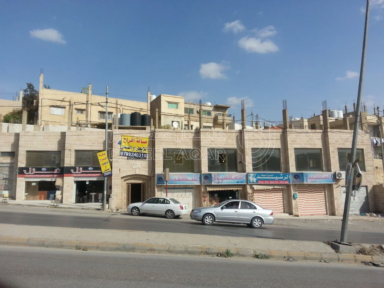 مبنى في الرصيفة حي الرشيد - 400,000 دأ - صورة 1