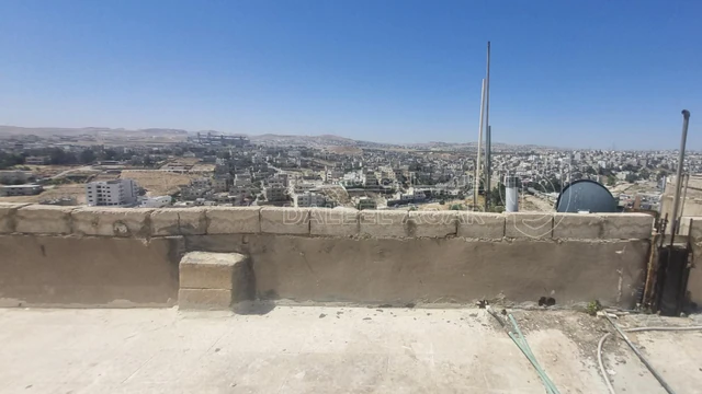 مبنى في الزرقاء عوجان الغربي شارع طارق بن زياد - 39,000 دأ - صورة NaN