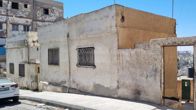 مبنى في الزرقاء عوجان الغربي شارع طارق بن زياد - 39,000 دأ - صورة NaN