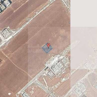 أرض في قطعه ارض خريبة السوق على شارع 12م - 35,000 دأ - صورة 1