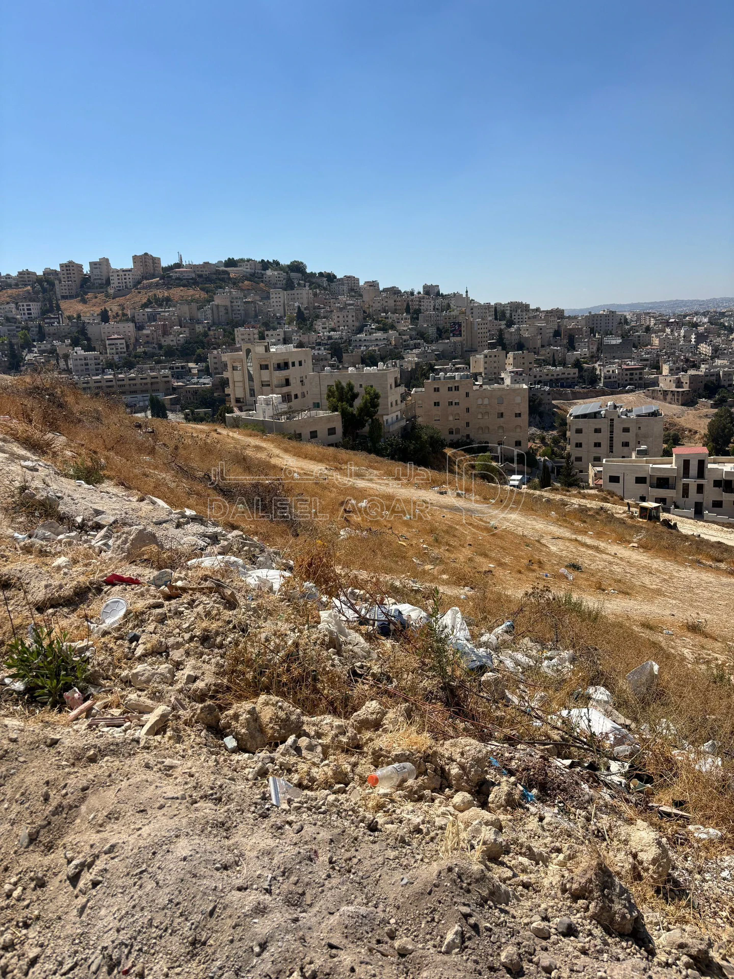 أرض في ارض للبيع في صويلح على اطلالة مميزة جدا بتنظيم ب  - 240,000 دأ - صورة 1