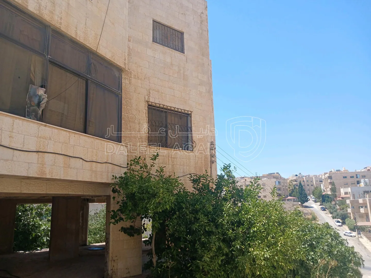 مبنى في طبربور شارع ام حرام  - 380,000 دأ - صورة 1