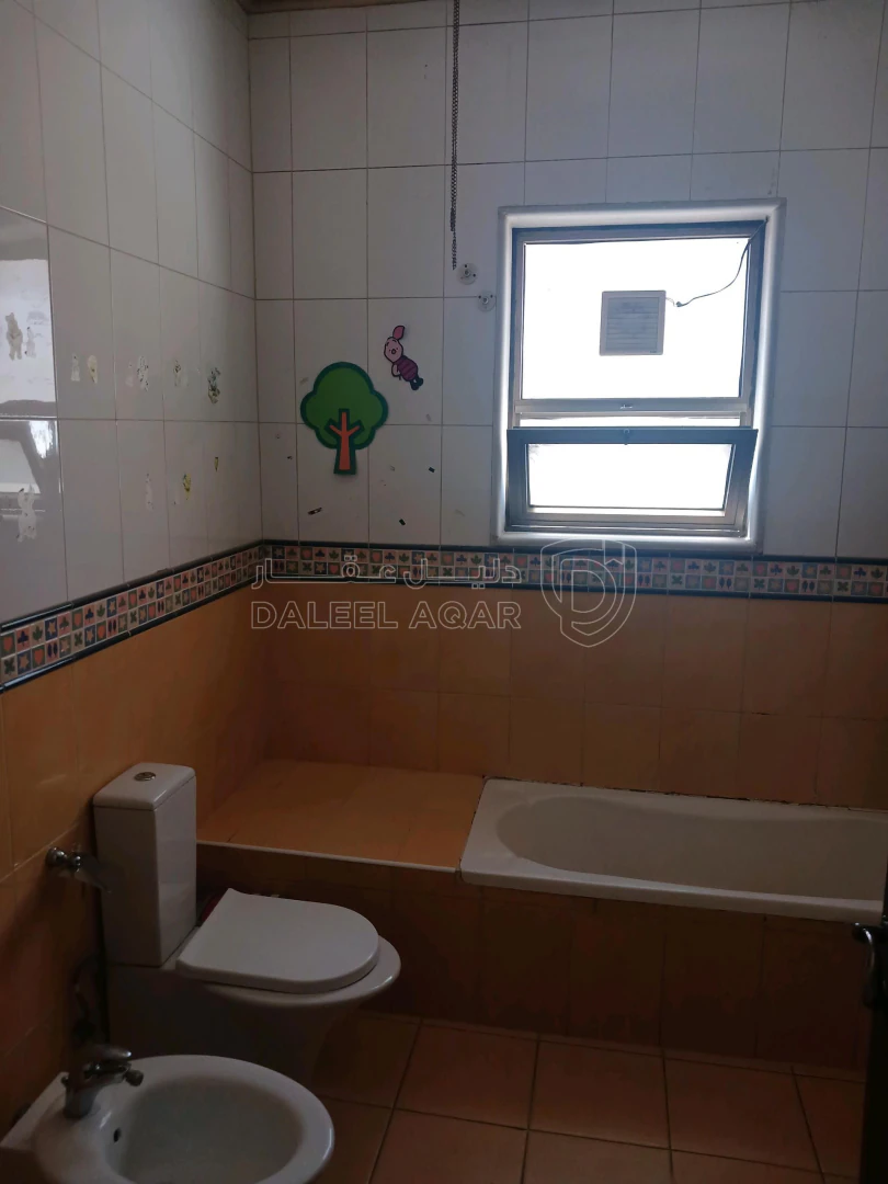 مبنى في طبربور شارع ام حرام  - 380,000 دأ - صورة 1