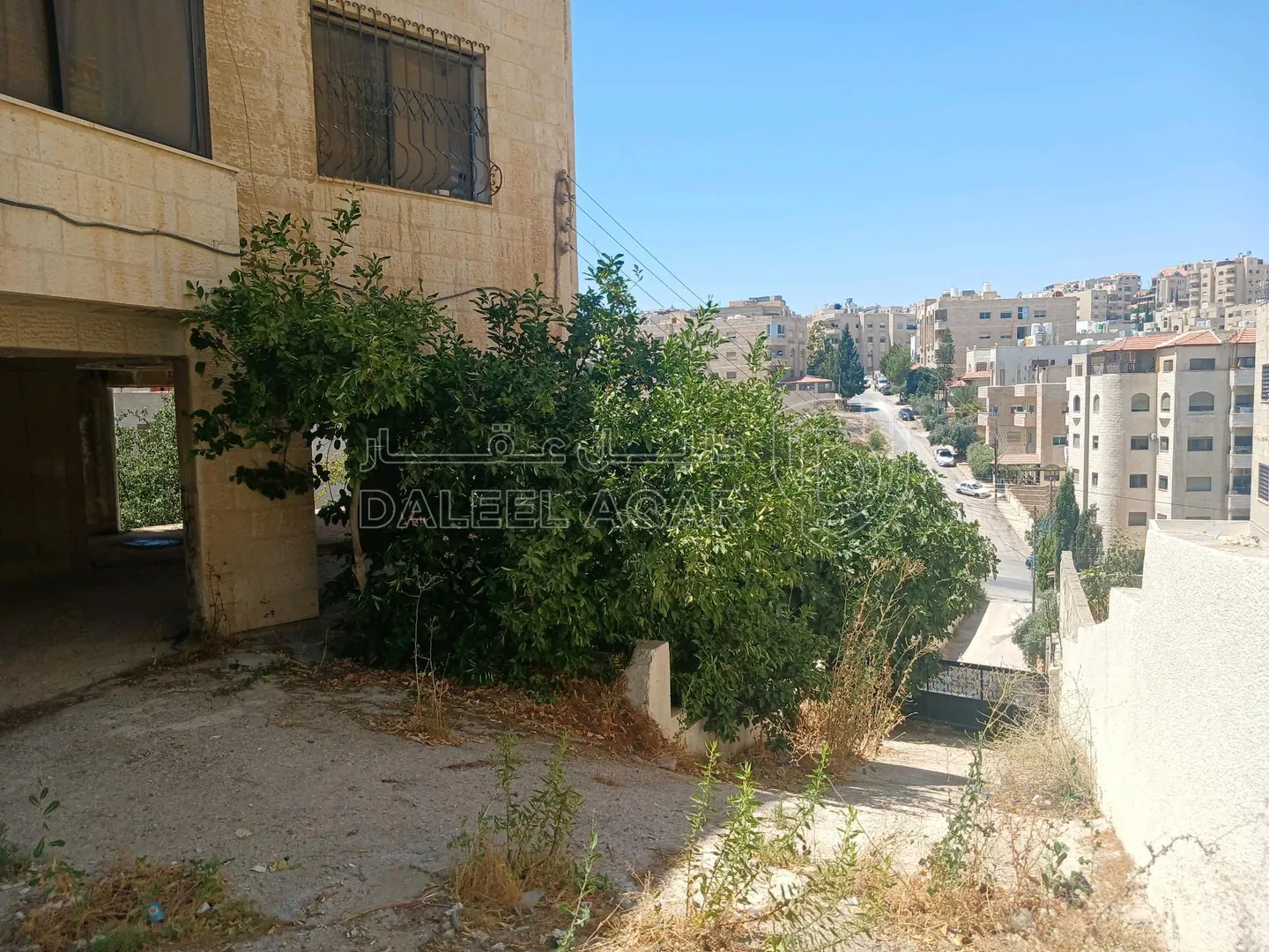 مبنى في طبربور شارع ام حرام  - 380,000 دأ - صورة 1