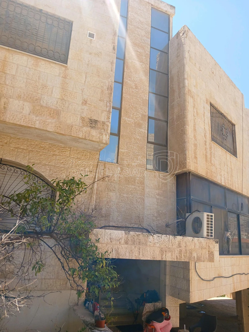 مبنى في طبربور شارع ام حرام  - 380,000 دأ - صورة 1