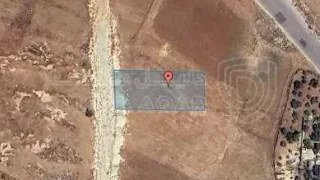 أرض - قرب الجامعة التطبيقية - 115000 دأ