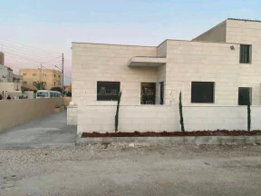 مبنى في مادبا الطريق الملوكي خلف موقف الباص السريع - 58,000 دأ - صورة NaN