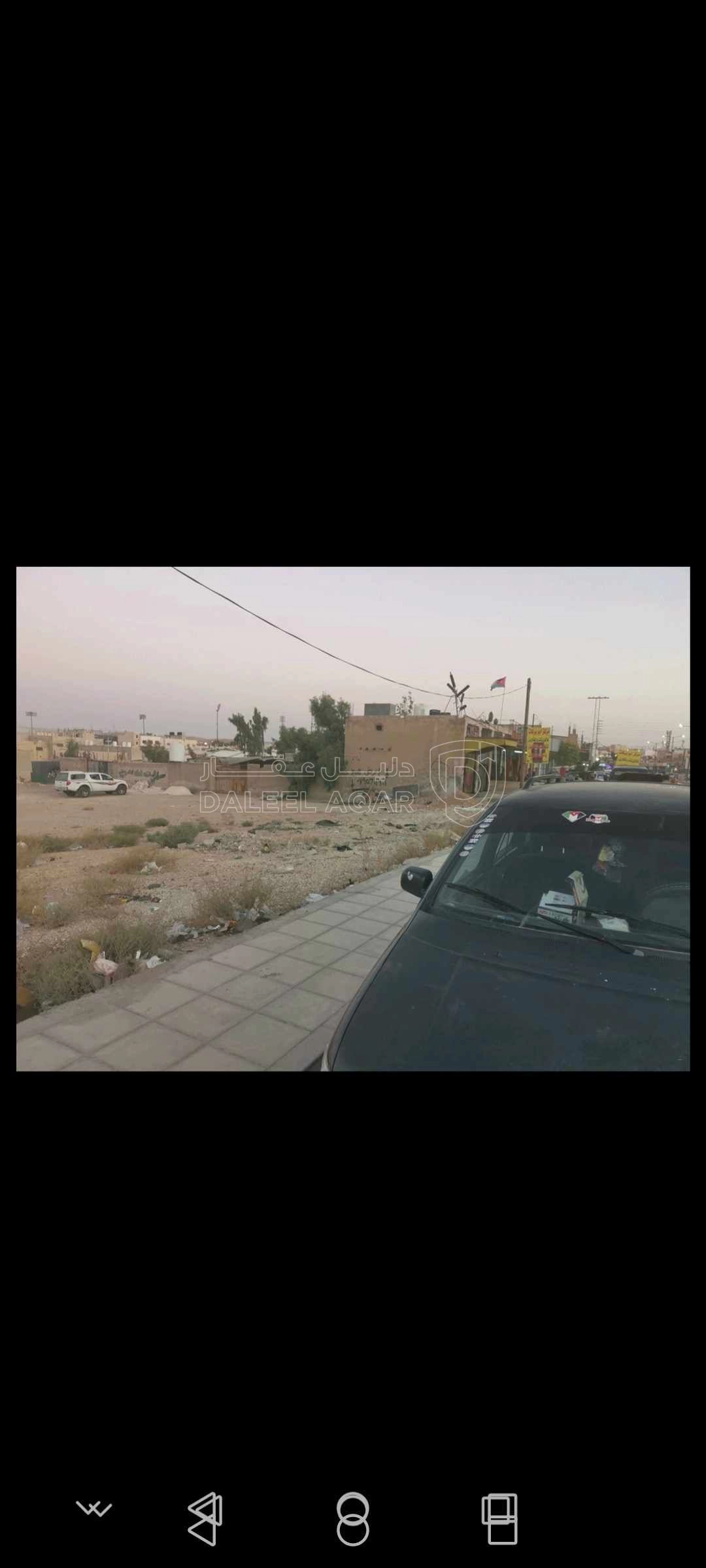 أرض في ارض مميزه شارع المصفاه على شارع رئيسي و شارع جانبي - 315,700 دأ - صورة 1