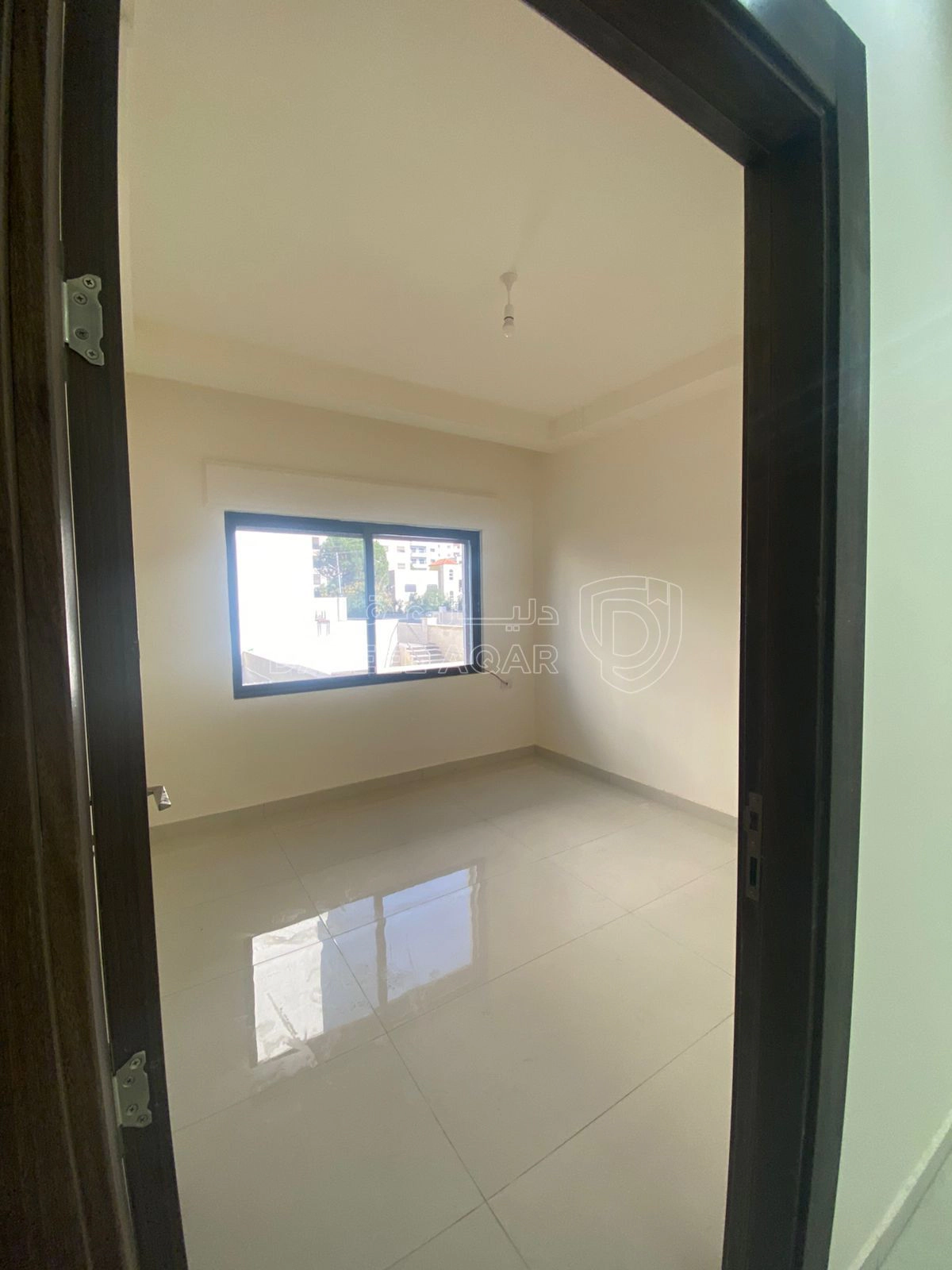 شقة في شقة ارضية في ضاحية الامير علي تشطيب فخم  - 73,000 دأ - صورة 1