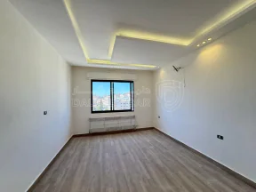 شقة في شقة طابق ارضي مع ترس امامي بمشروع 120 خلدا سكن خاص - 240,000 دأ - صورة NaN