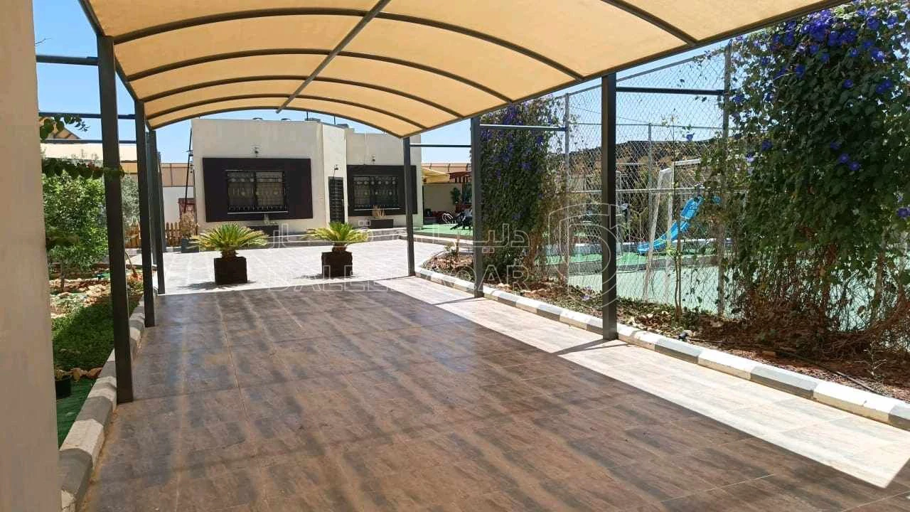 مزرعة/شاليه في  جنوب جسر المطار زويزا - 140,000 دأ - صورة 1