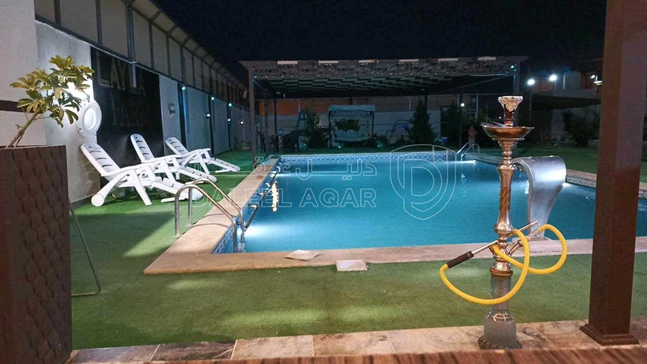 مزرعة/شاليه في  جنوب جسر المطار زويزا - 140,000 دأ - صورة 1