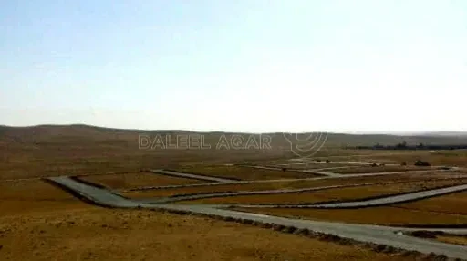 أرض في شمال شرق مطار الملكة علياء الدولي - 30,000 دأ - صورة 1
