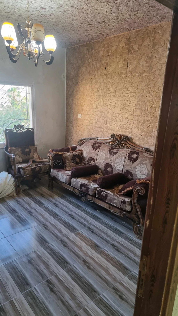 شقة في العالمية مقابل السيفوي عمارة ٣٩ طابق ٣ يسار - 35,000 دأ - صورة 2