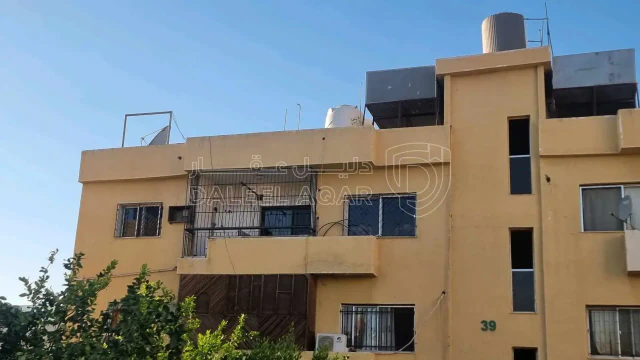 شقة في العالمية مقابل السيفوي عمارة ٣٩ طابق ٣ يسار - 35,000 دأ - صورة 1