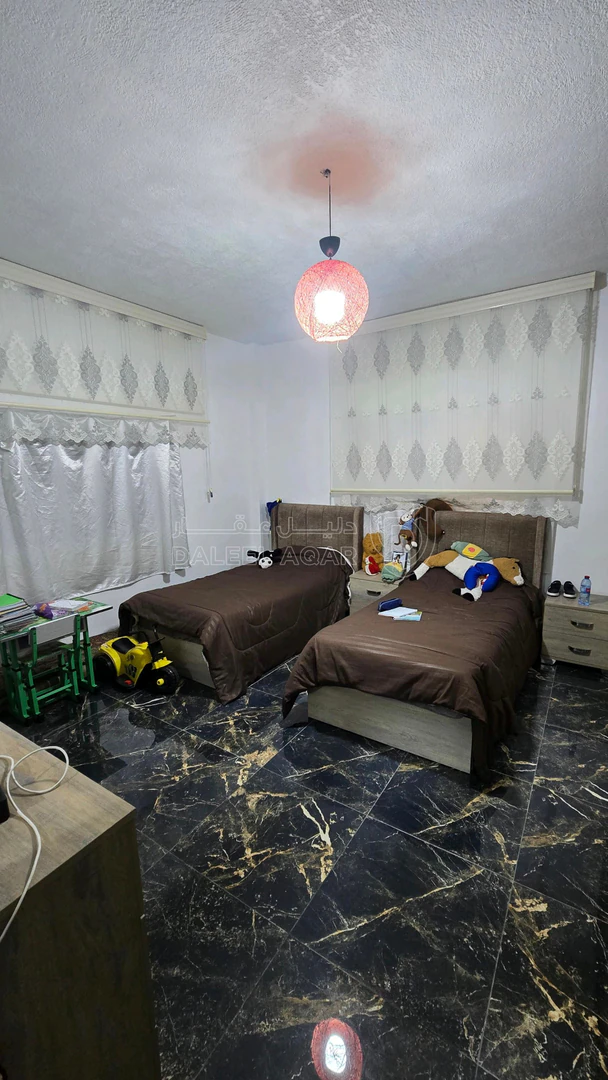 شقة في شقه طابق ارضي - 42,000 دأ - صورة 8