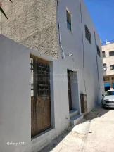 مبنى في الشارع التجاري مقابل صيدلية عين السخنة - 80,000 دأ - صورة NaN