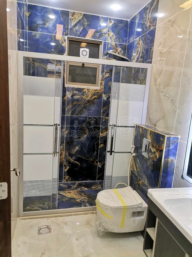 شقة في   جنوب كليه الطب لجامعه اليرموك خلف صيدلية الرازي  - 95,000 دأ - صورة 1