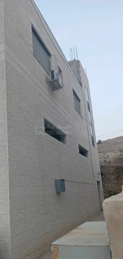 مبنى في  عراق الامير قرب دفاع مدني عراق الامير /  وادي الس - 100,000 دأ - صورة 1