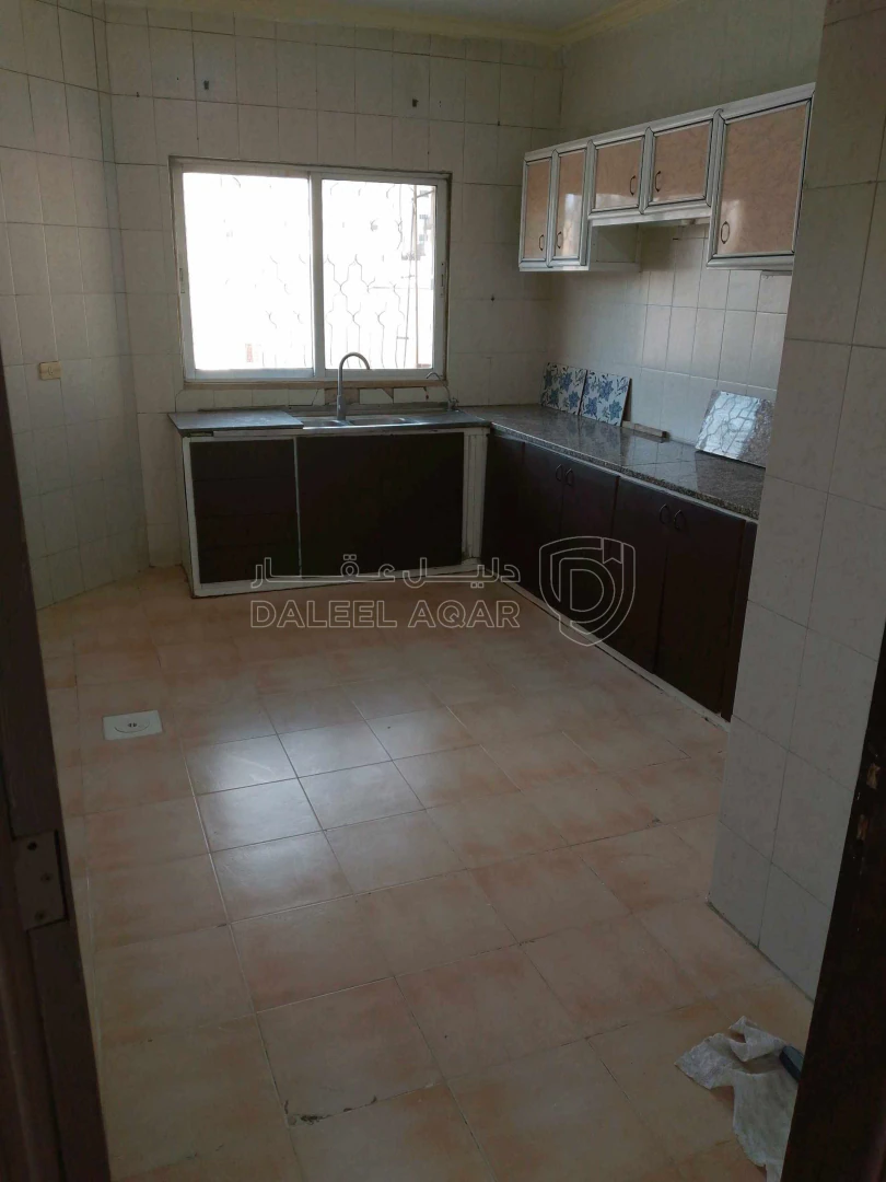 شقة في الهاشمي الشمالي مقابل بنك الاسلامي - 33,000 دأ - صورة 1