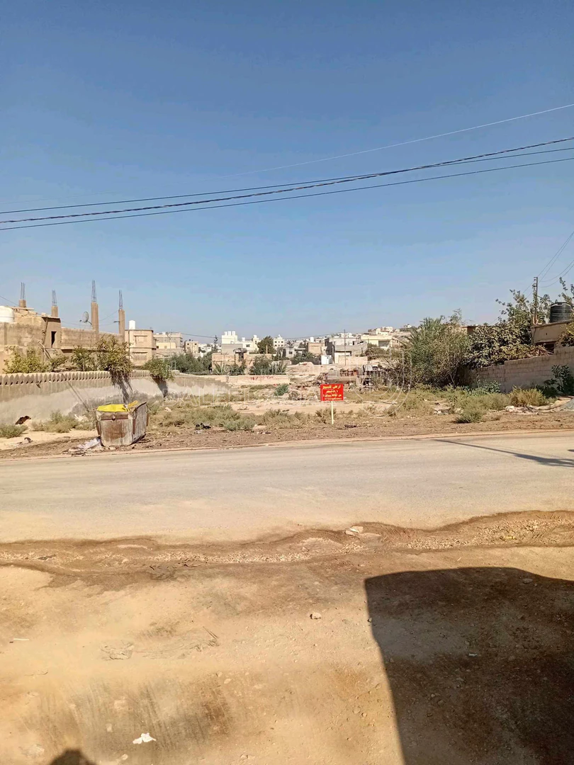 أرض في زرقاء  الهاشمية  - 18,000 دأ - صورة 1