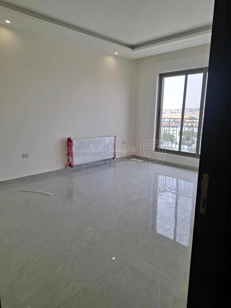 شقة في ضاحية الرشيد خلف الجامعة الاردنية  - 135,000 دأ - صورة 1