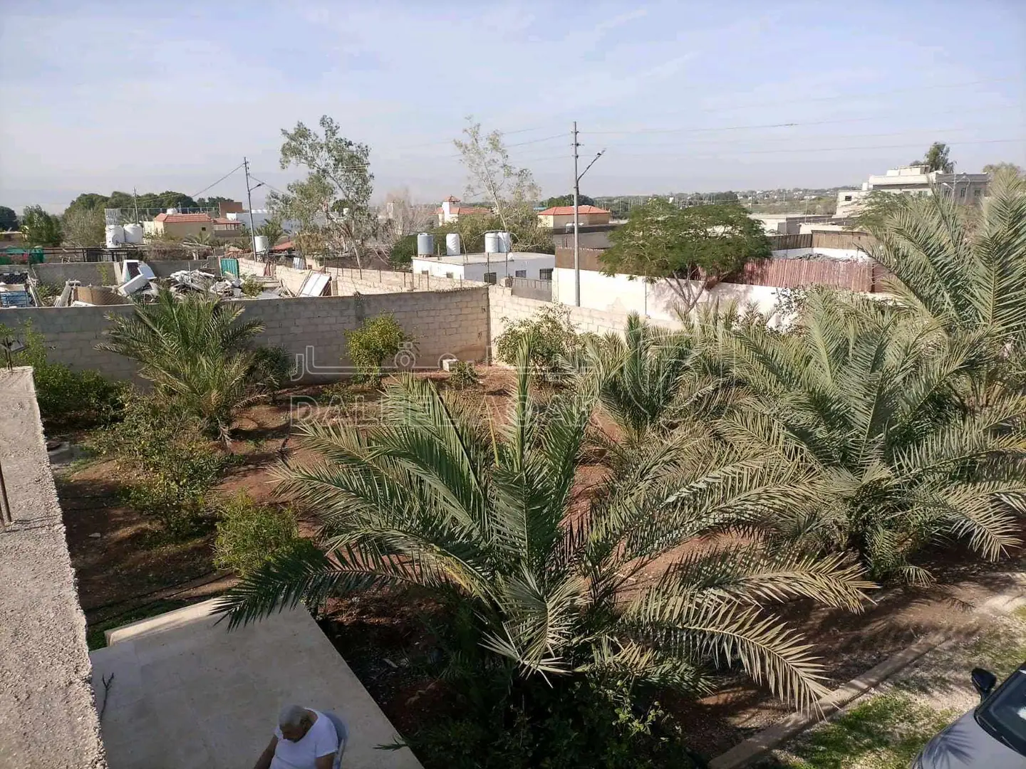 أرض في للبيع قطعتين متجاورتين عليهما سور واحد ٩٧٥ و ٩٧٦ - 50,000 دأ - صورة 1