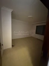 شقة - ضاحية الرشيد خلف مدرسة المنهل شارع الحاووز - 88000 دأ