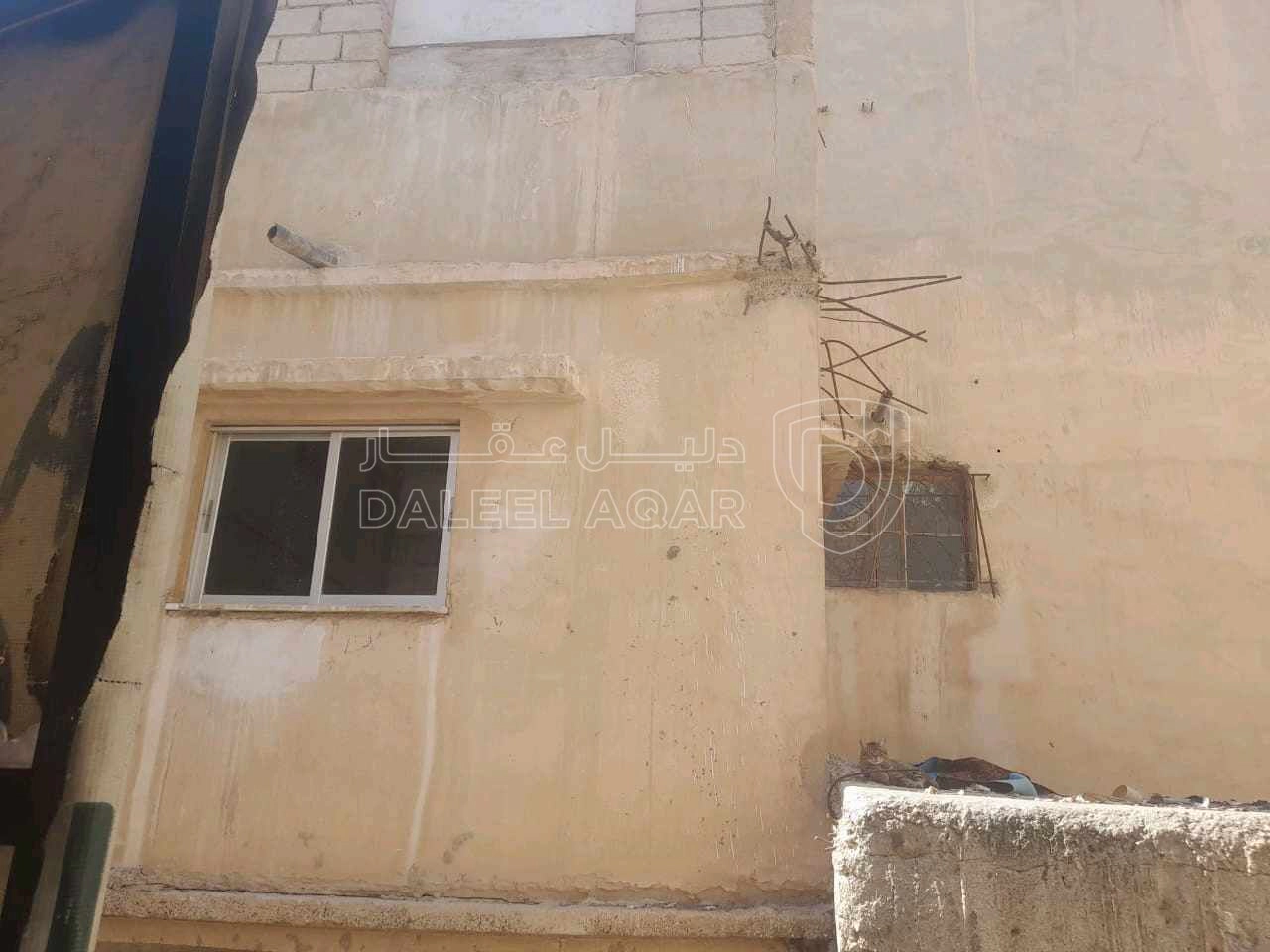 مبنى في الزرقا حي معصوم على نزول مدرسة حي رمزي - 20,000 دأ - صورة 1