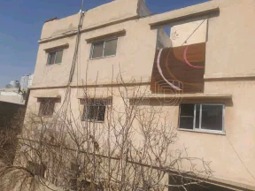 مبنى في الزرقا حي معصوم على نزول مدرسة حي رمزي  - 20,000 دأ - صورة NaN