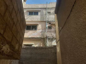 مبنى في الزرقا حي معصوم على نزول مدرسة حي رمزي  - 20,000 دأ - صورة NaN
